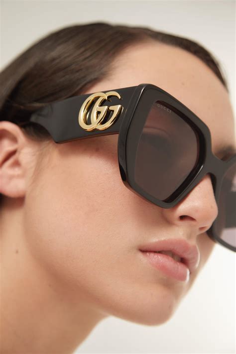 gucci sun glasses.